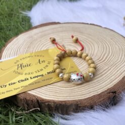 Vòng dâu tằm 2 bi bạc mèo kitty cho bé loại dây rút